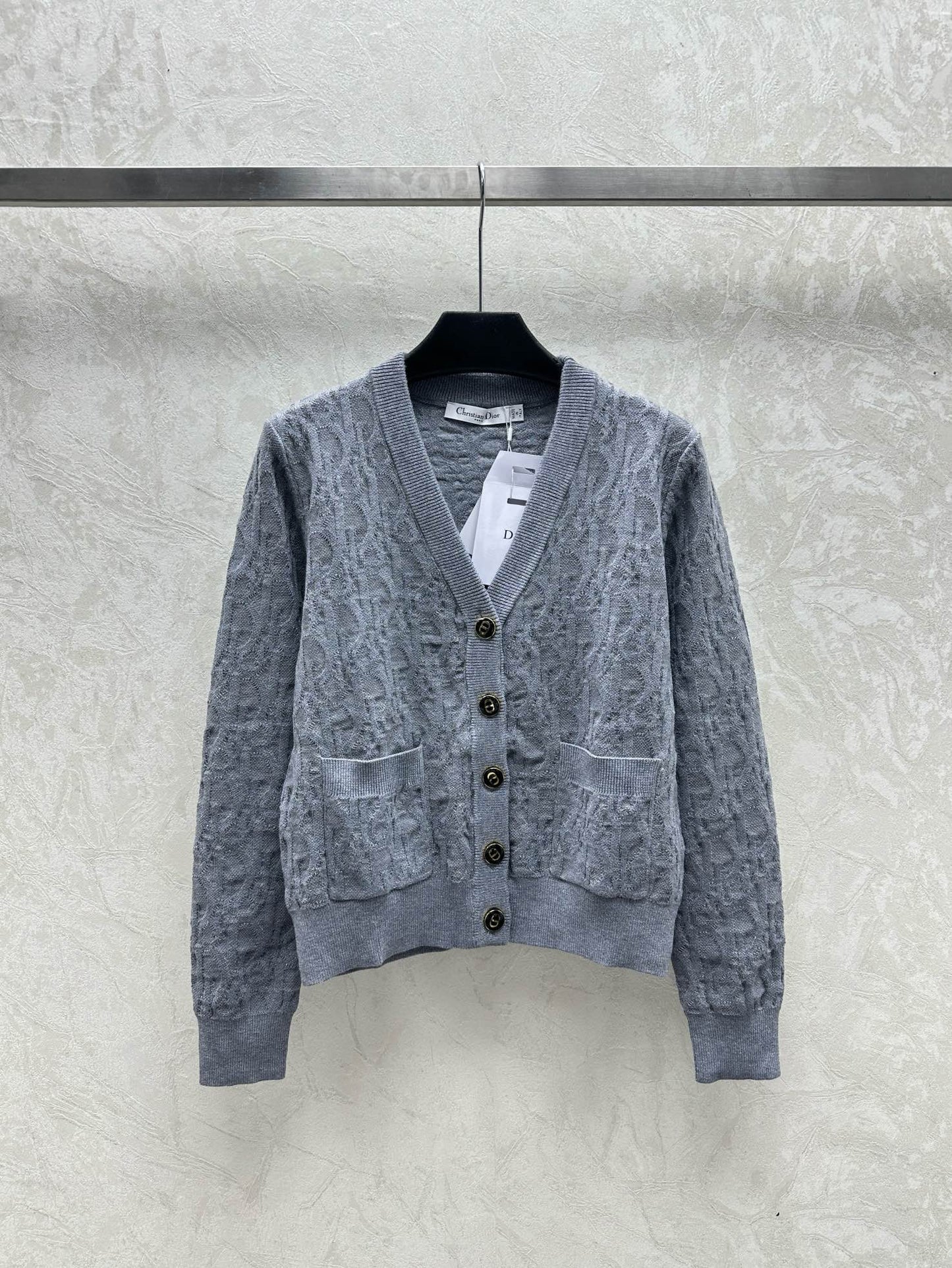 Chaqueta tipo cárdigan de punto jacquard oscuro con cuello en V