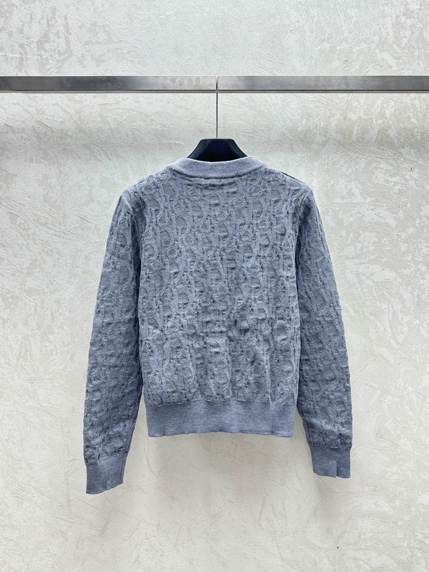 Chaqueta tipo cárdigan de punto jacquard oscuro con cuello en V