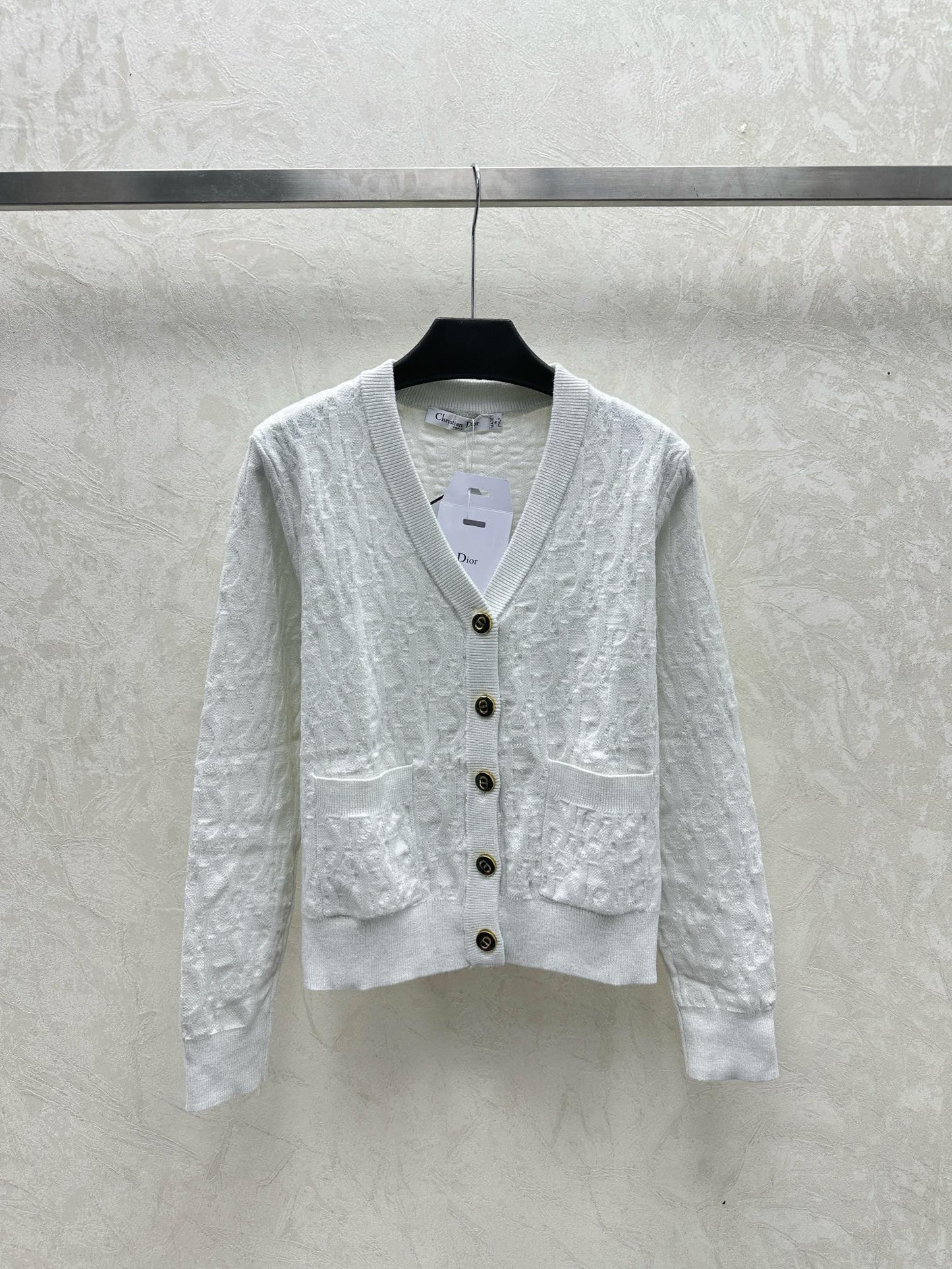 Chaqueta tipo cárdigan de punto jacquard oscuro con cuello en V