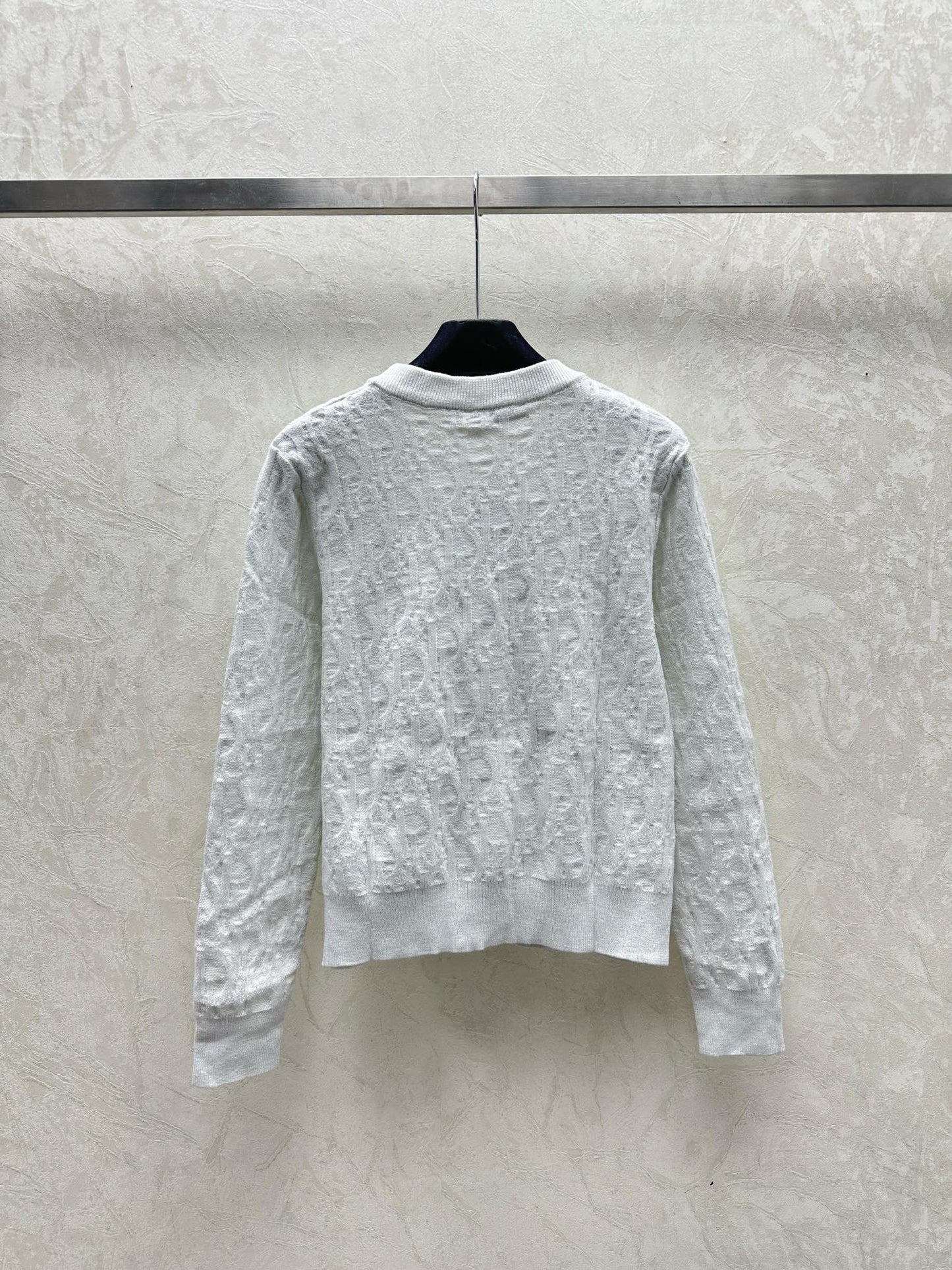 Chaqueta tipo cárdigan de punto jacquard oscuro con cuello en V