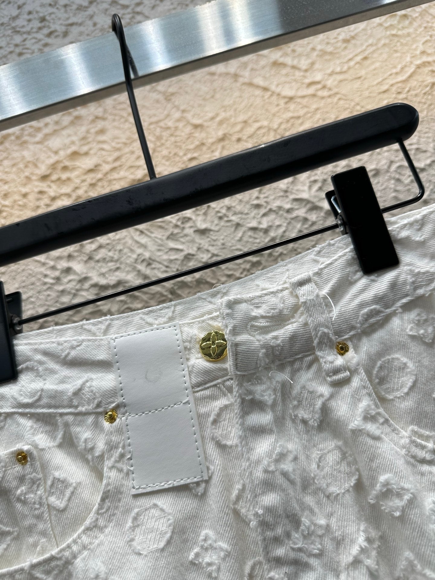 White embroidered letter shorts