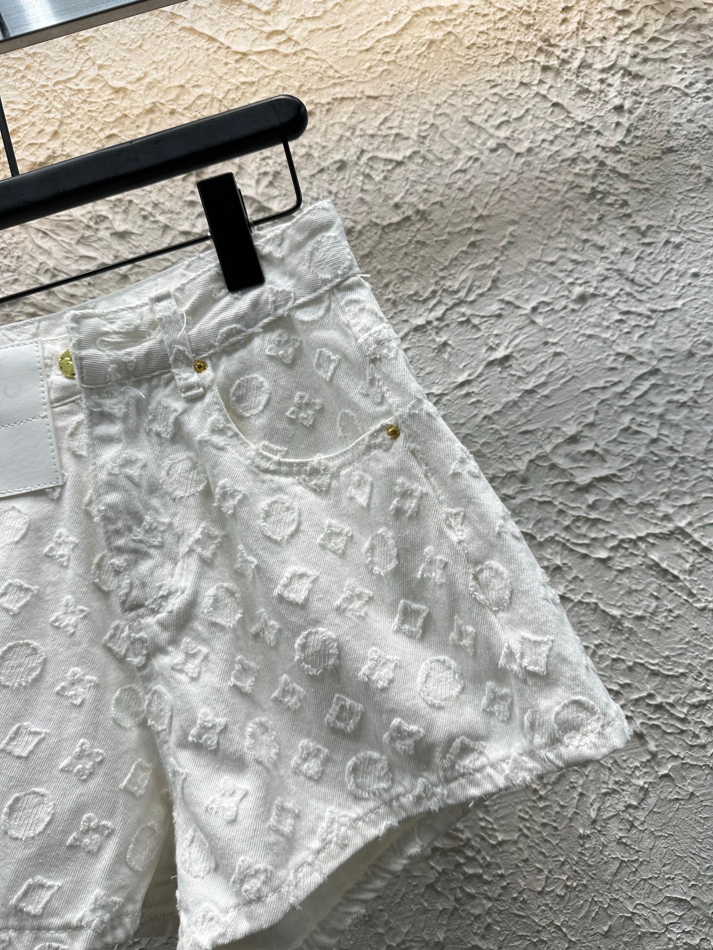 White embroidered letter shorts