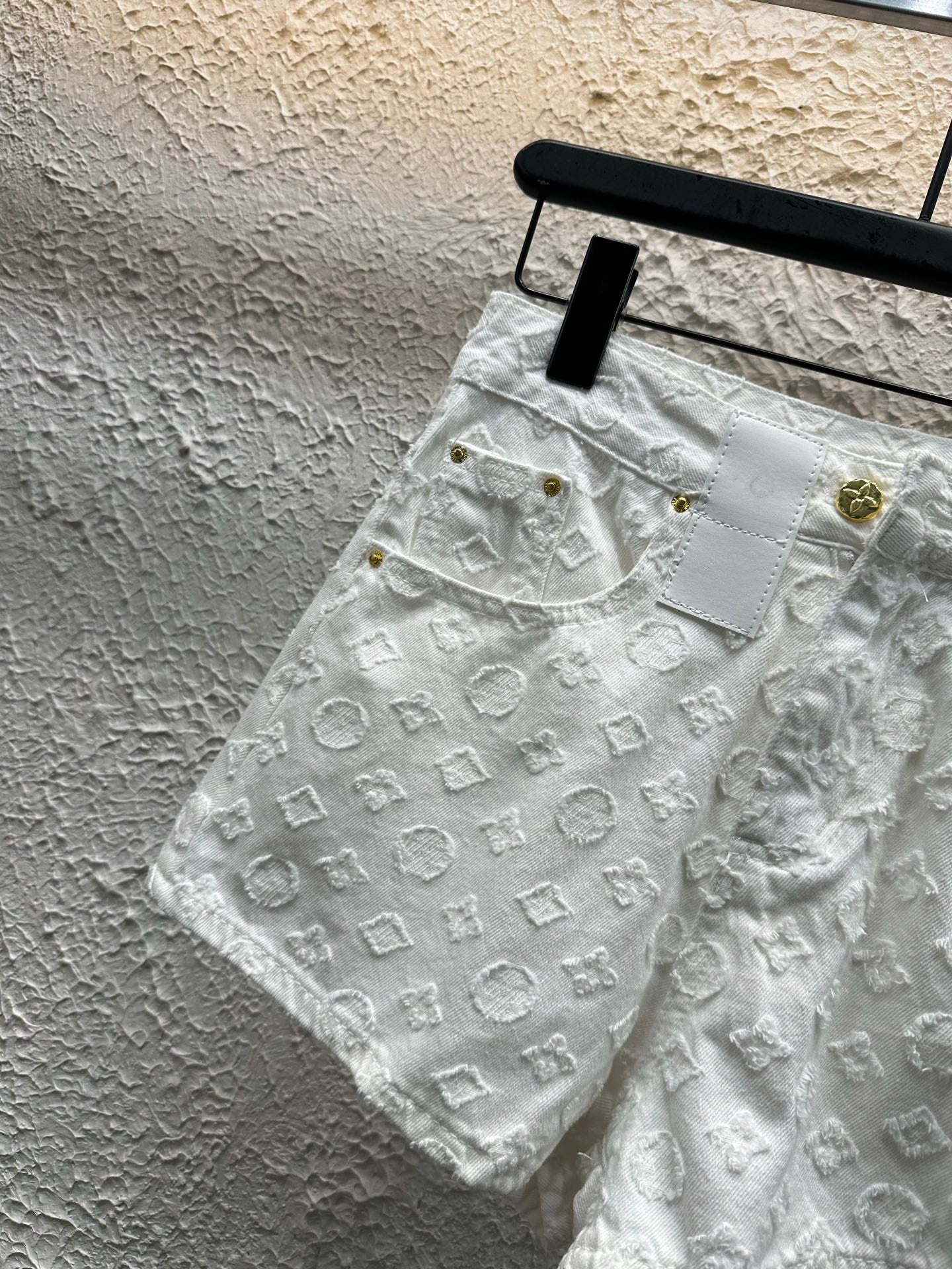 White embroidered letter shorts