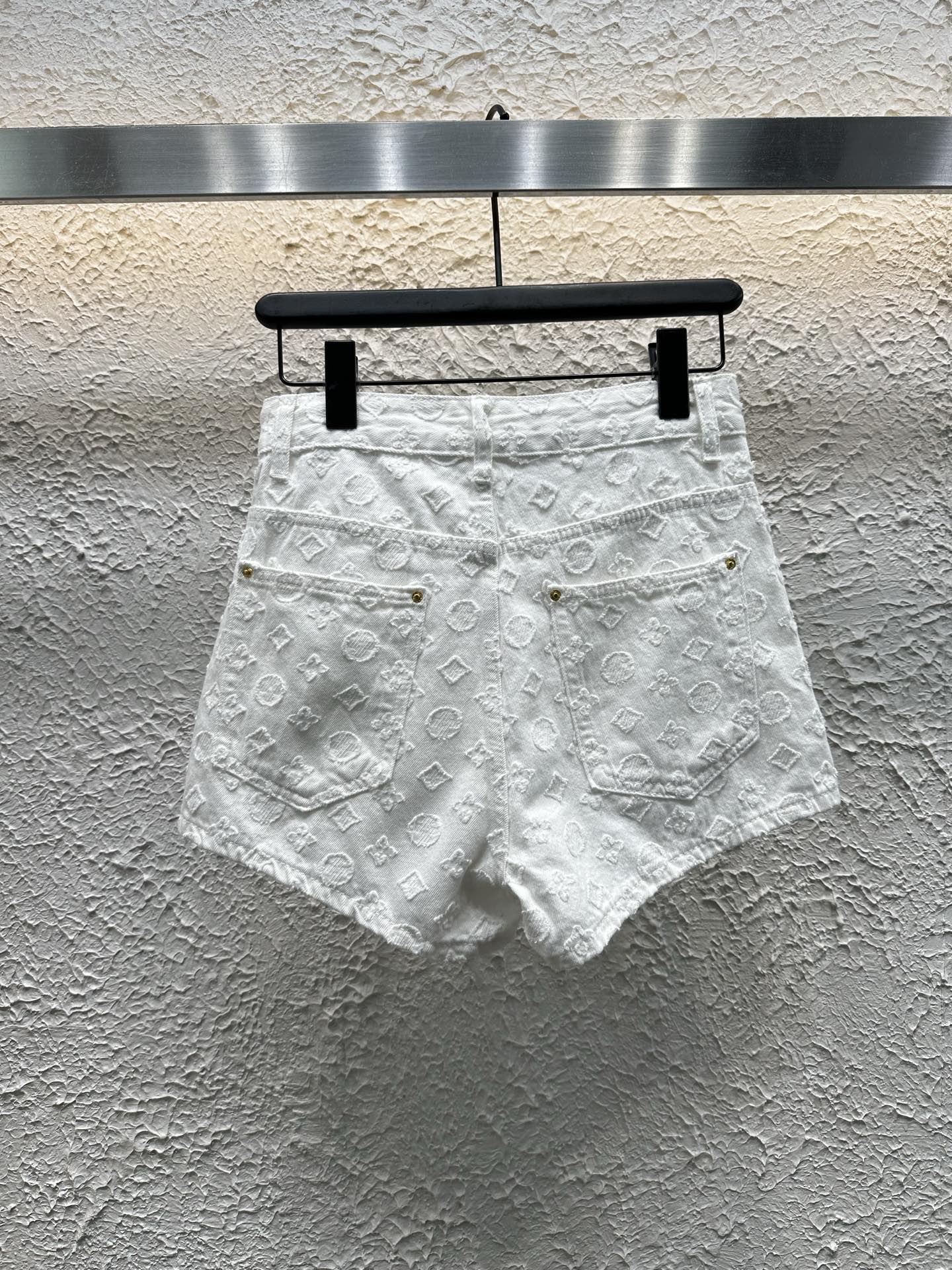 White embroidered letter shorts