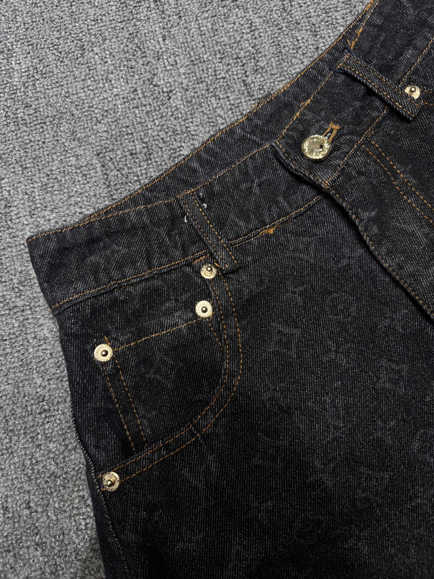 Denim shorts with monogram and two-tone letters
