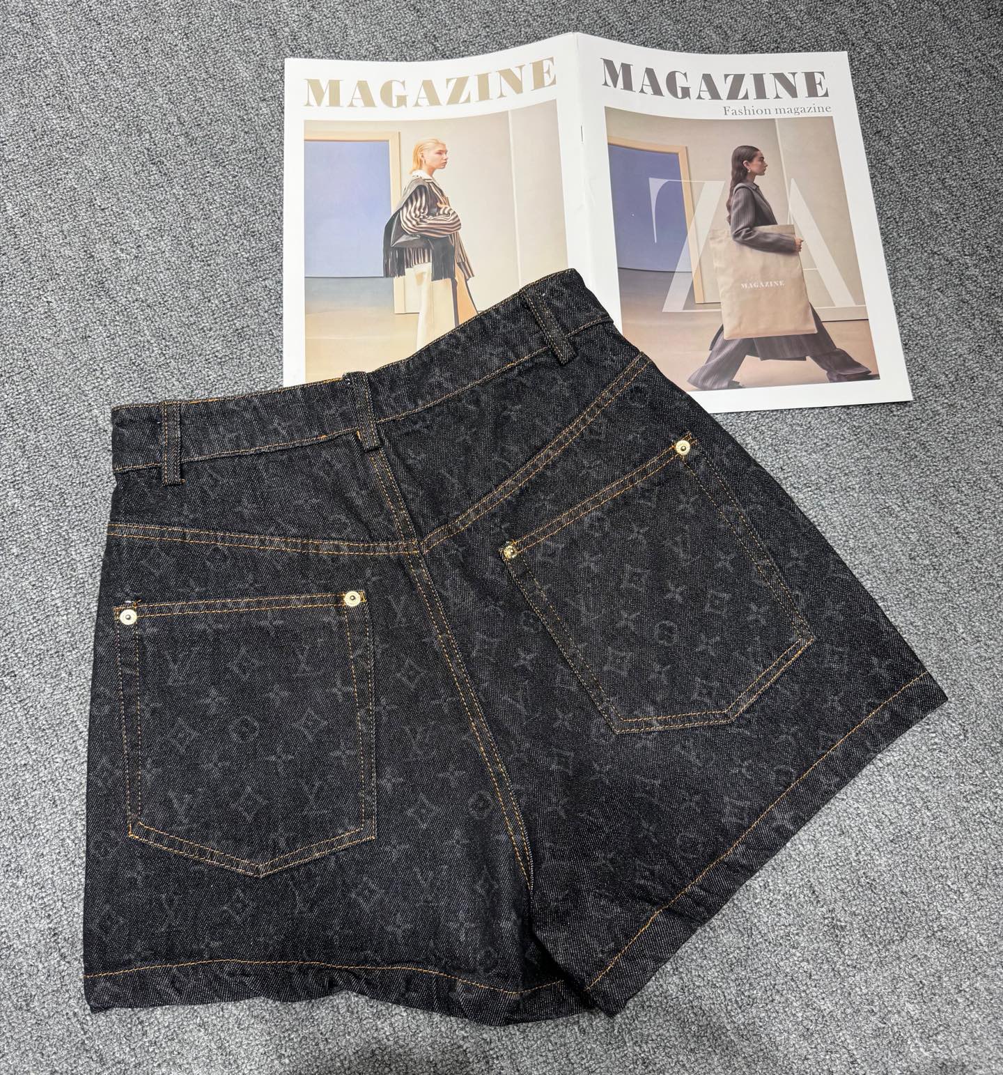 Denim shorts with monogram and two-tone letters