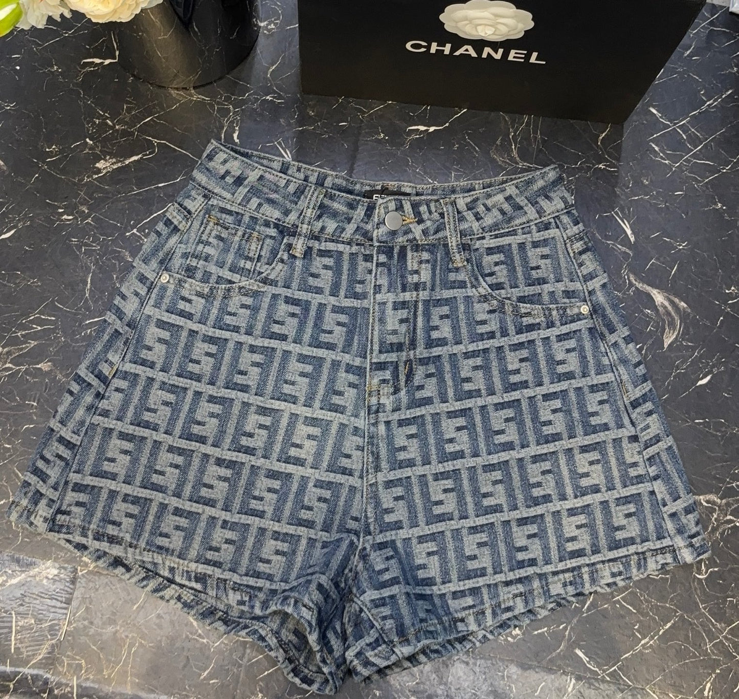 Two-tone printed denim shorts