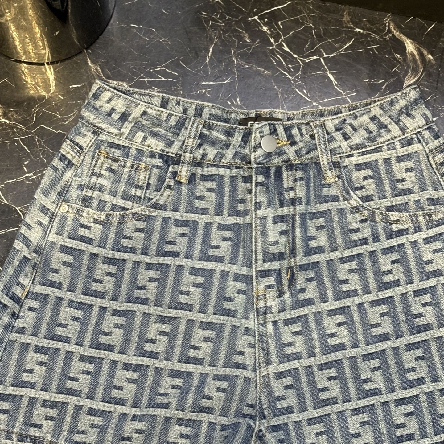 Two-tone printed denim shorts