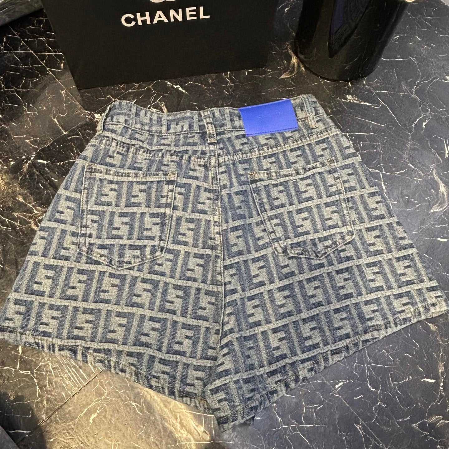 Two-tone printed denim shorts
