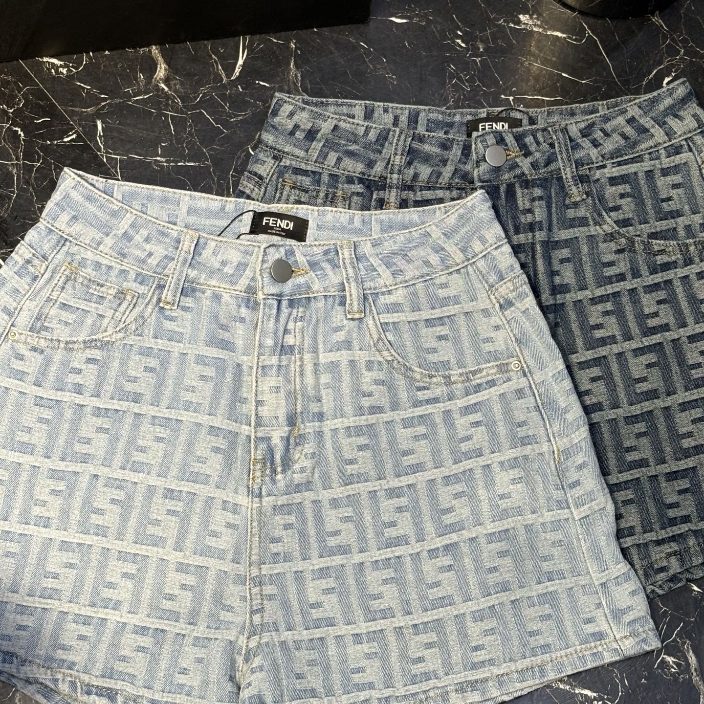 Two-tone printed denim shorts