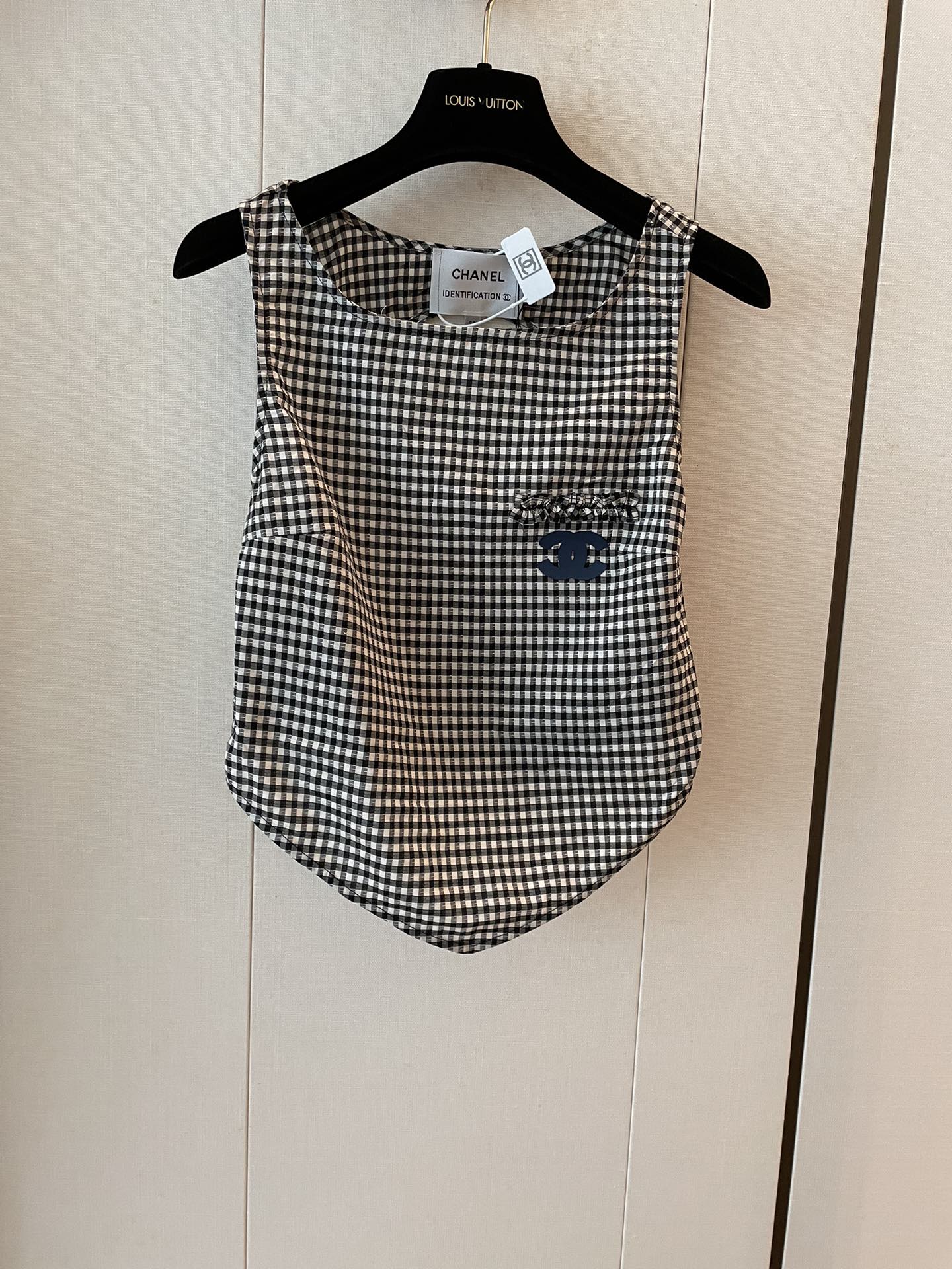 New houndstooth irregular cut back vest