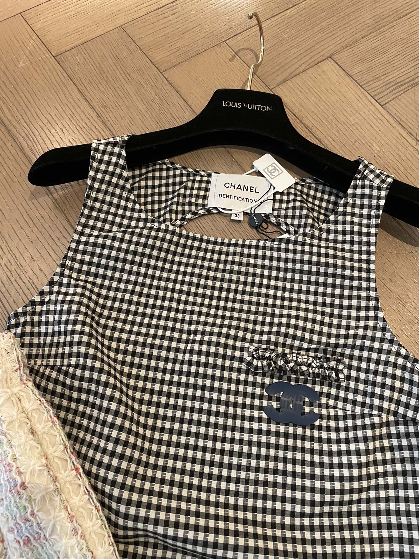 New houndstooth irregular cut back vest
