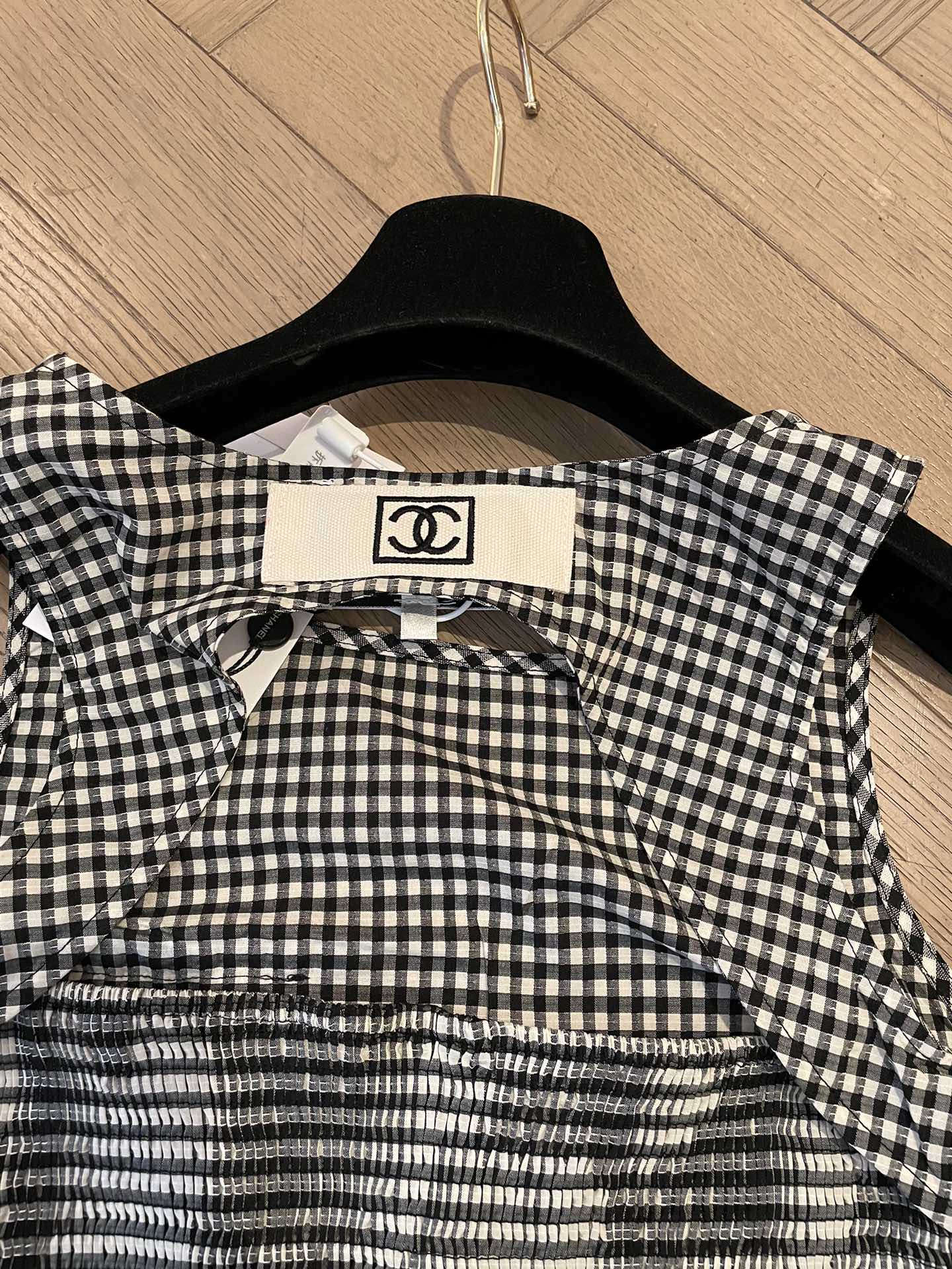 New houndstooth irregular cut back vest
