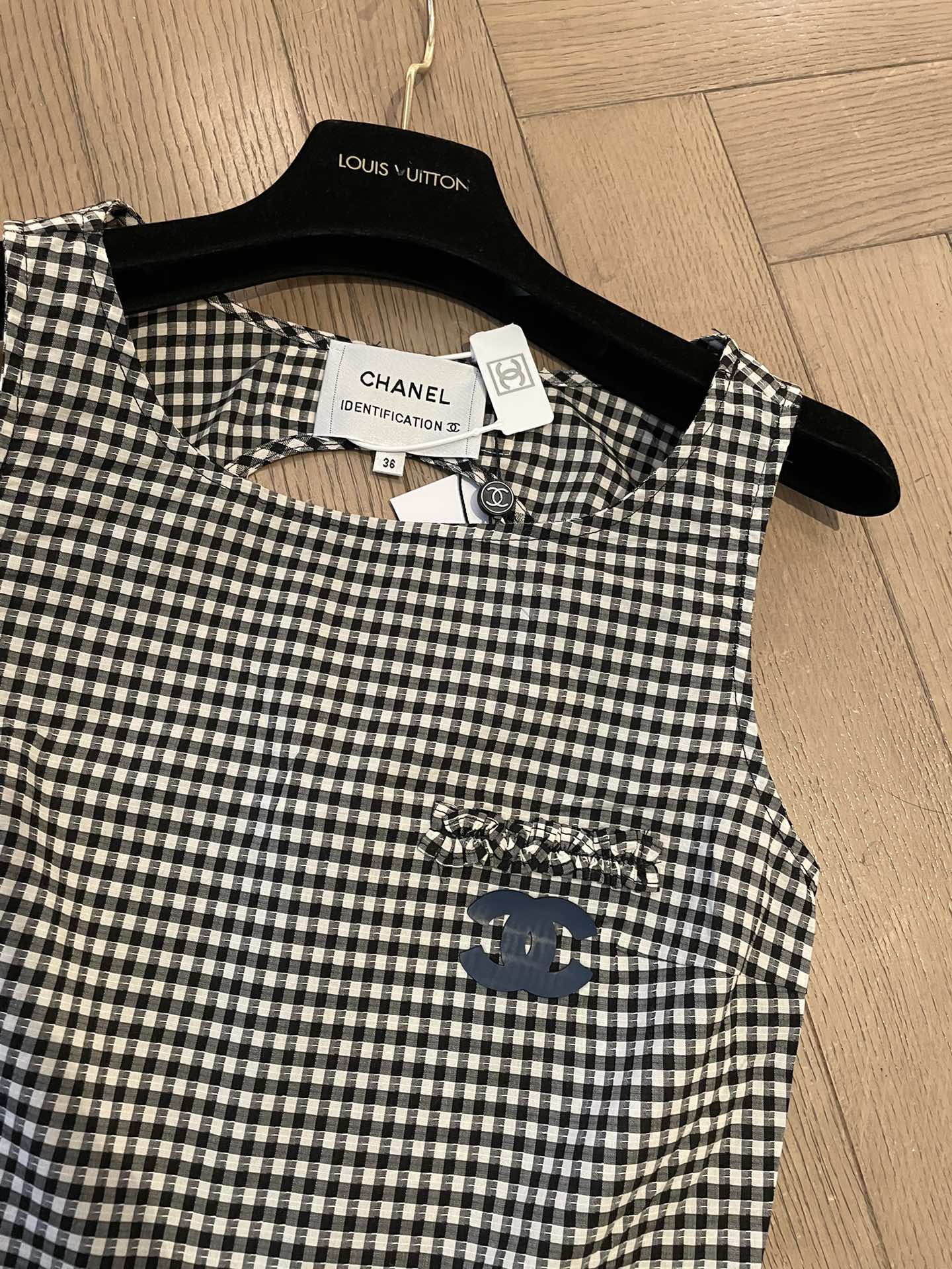 New houndstooth irregular cut back vest