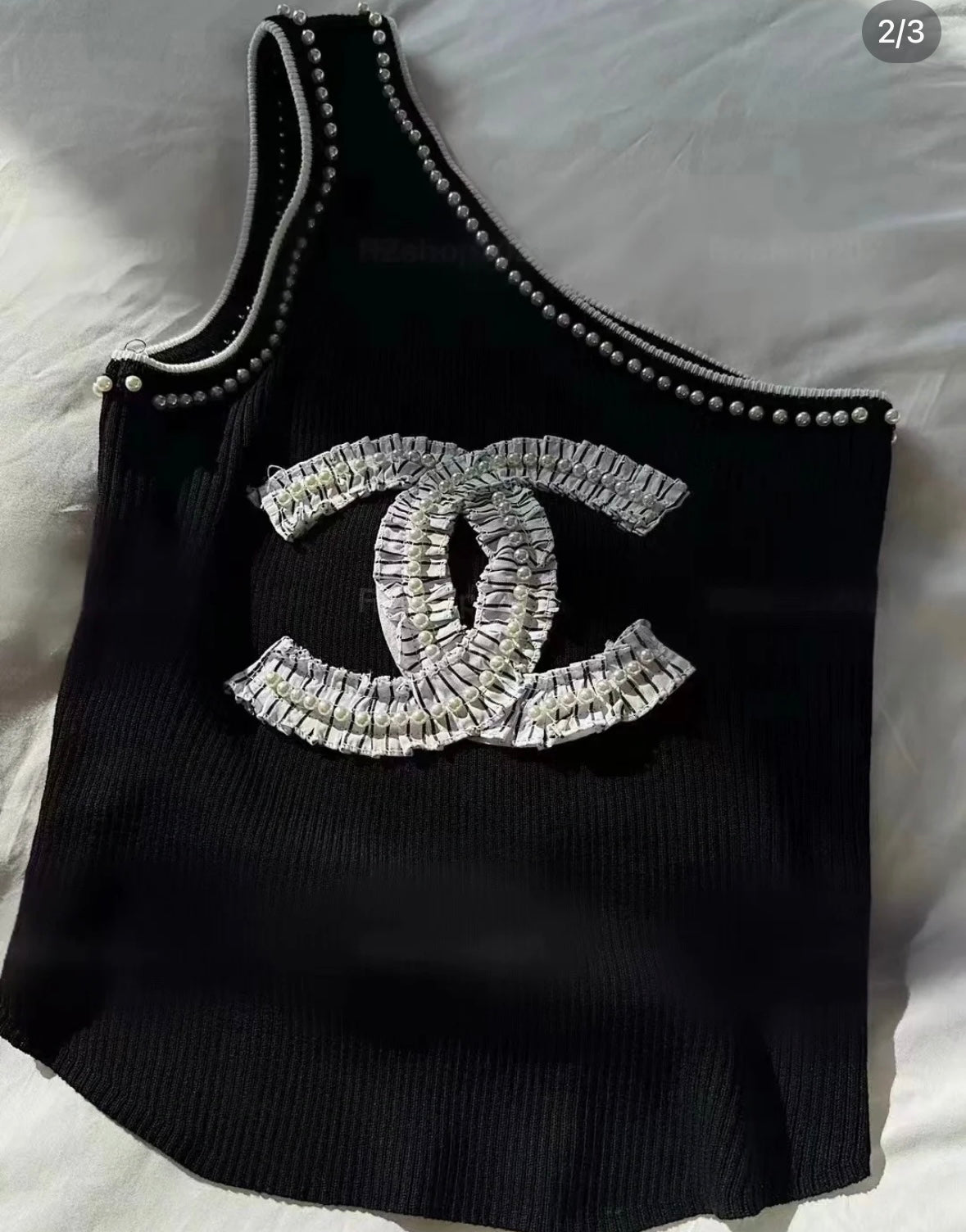 Pearl sloping shoulder vest