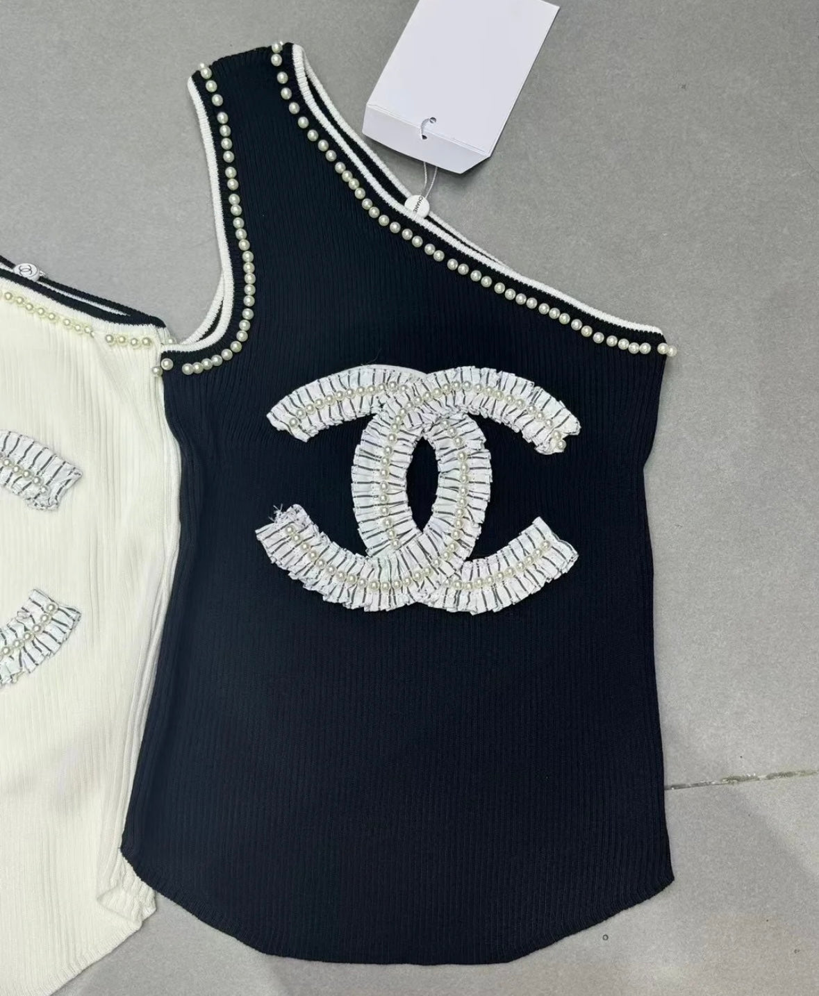 Pearl sloping shoulder vest