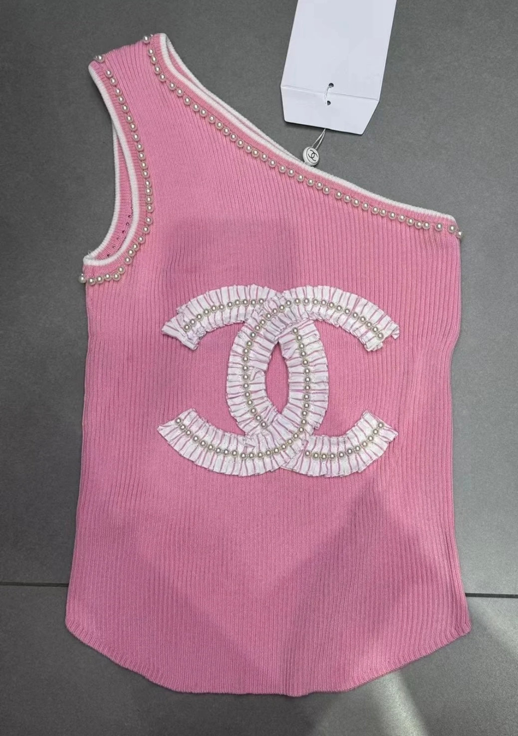 Pearl sloping shoulder vest