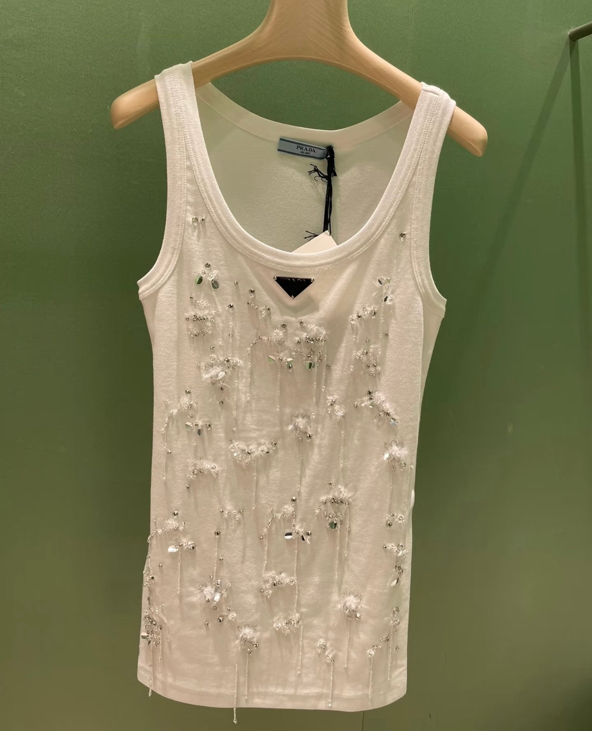 Three sizes of fringed vests