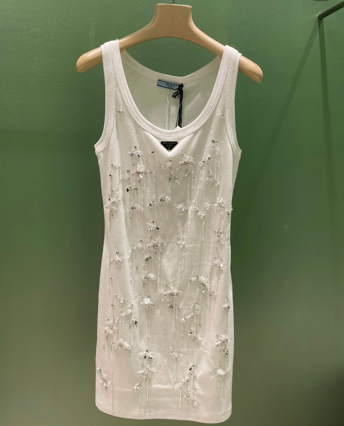 Three sizes of fringed vests