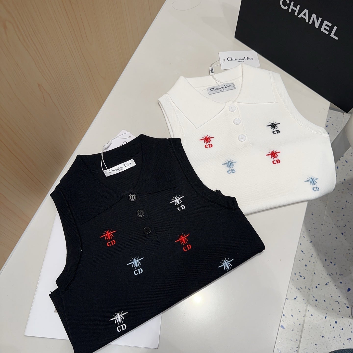 Small vest with a lapel logo print.