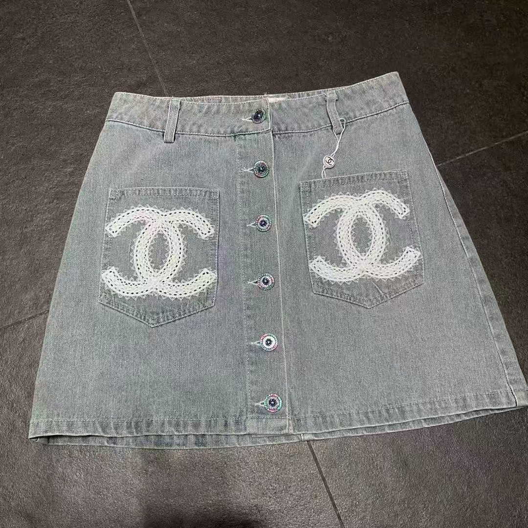 Embroidered logo washed denim mini skirt
