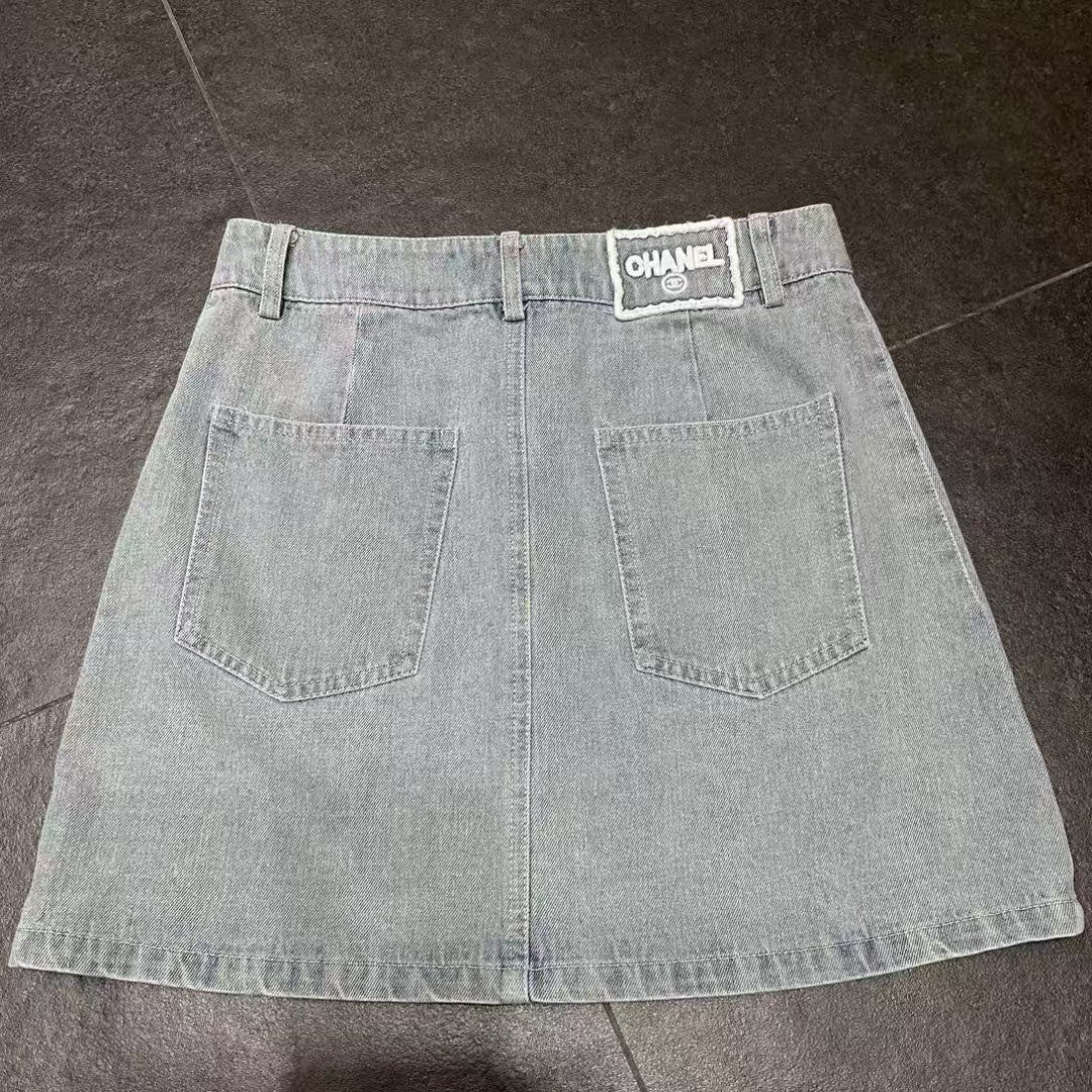 Embroidered logo washed denim mini skirt