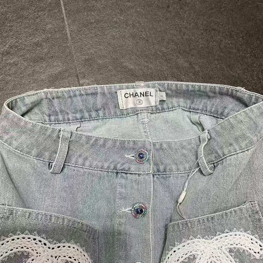 Embroidered logo washed denim mini skirt