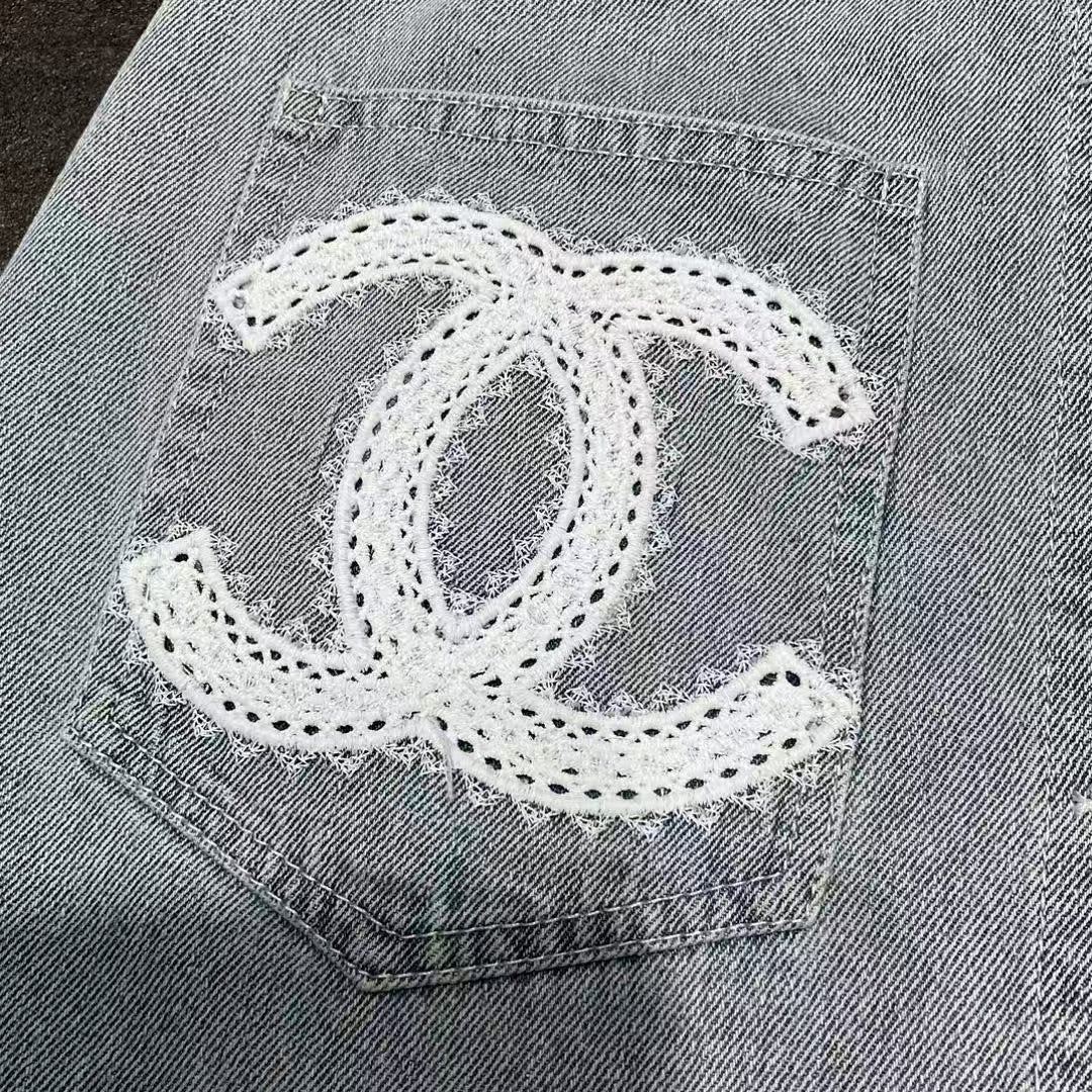 Embroidered logo washed denim mini skirt