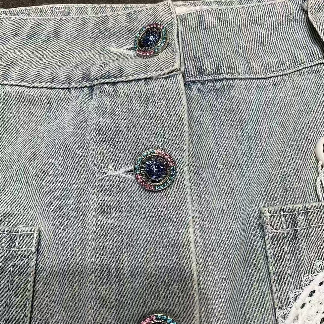 Embroidered logo washed denim mini skirt