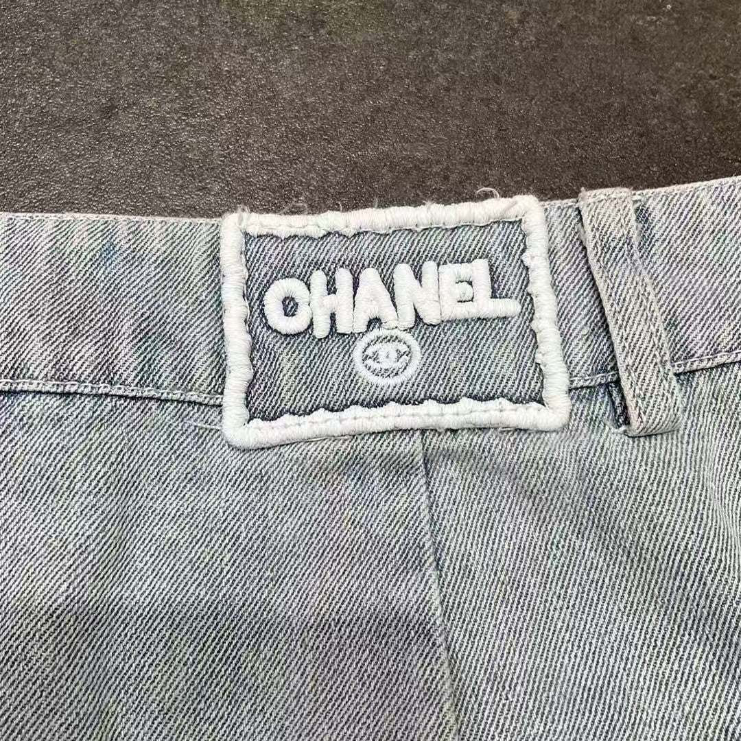 Embroidered logo washed denim mini skirt