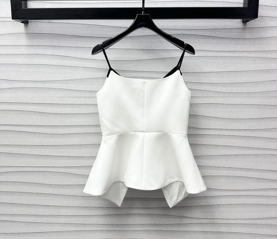 Wear a small suspender vest in a color matching suit.