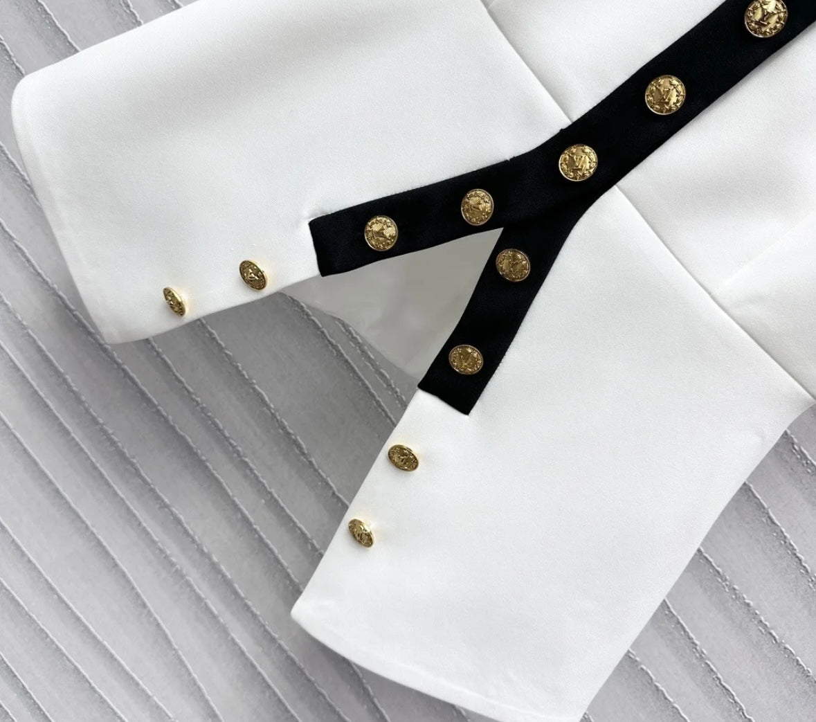 Wear a small suspender vest in a color matching suit.