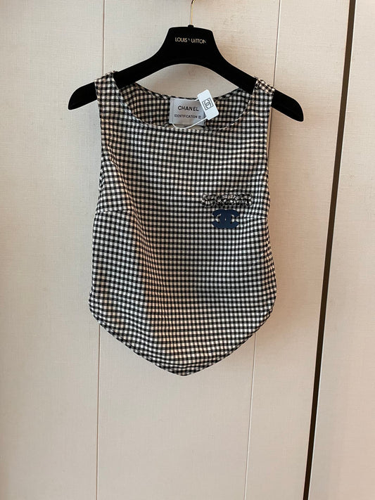 New houndstooth irregular cut back vest