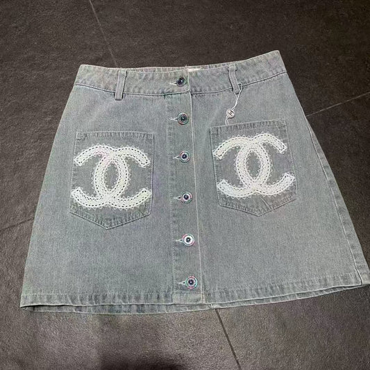 Embroidered logo washed denim mini skirt